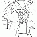 Der Junge ist zu Fuß in der regen